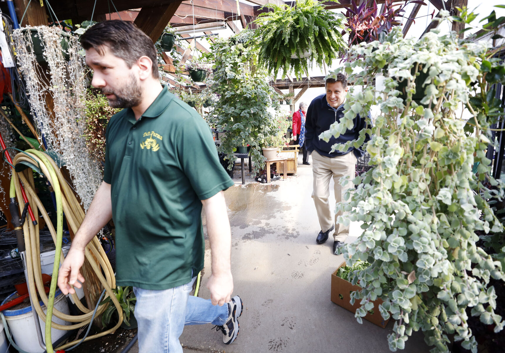 Paul Tawczynski leads Geoff Diehl through greenhouse